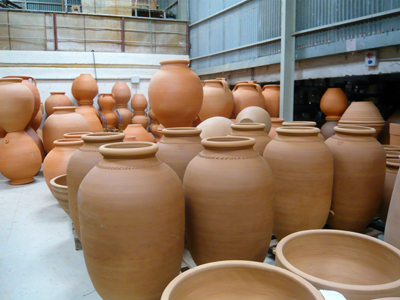 newly-fired-and-raw-tinajas.jpg